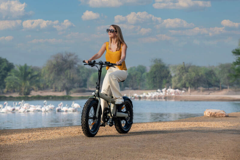 Biyiy Experience - woman riding e-bikes in the desert